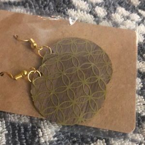 Homemade wooden earrings.  Circle gold